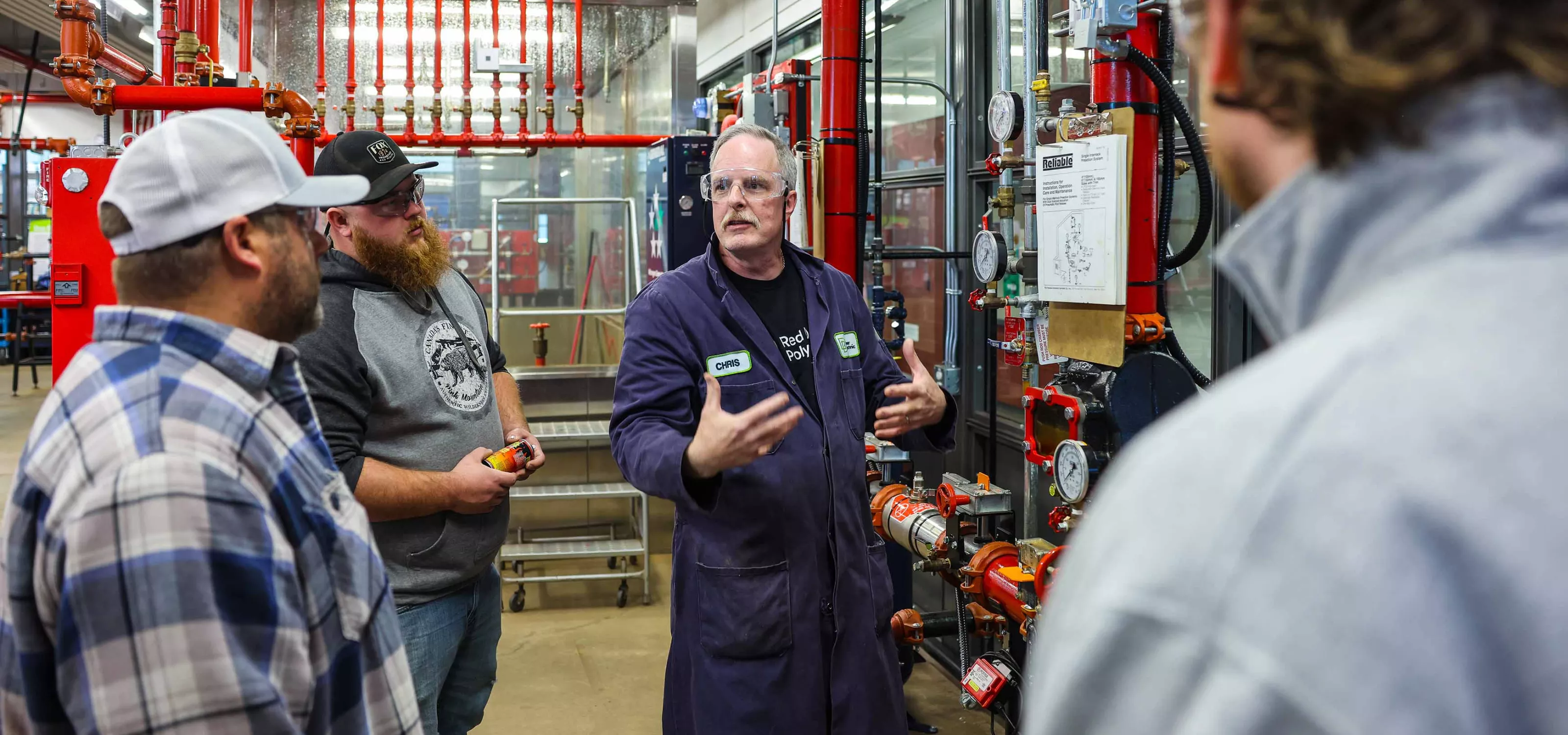 Sprinkler Systems instructor teaching students in lab